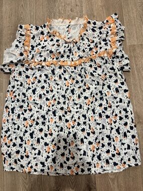 Printed top in Cream with Black & Orange Spot Pattern